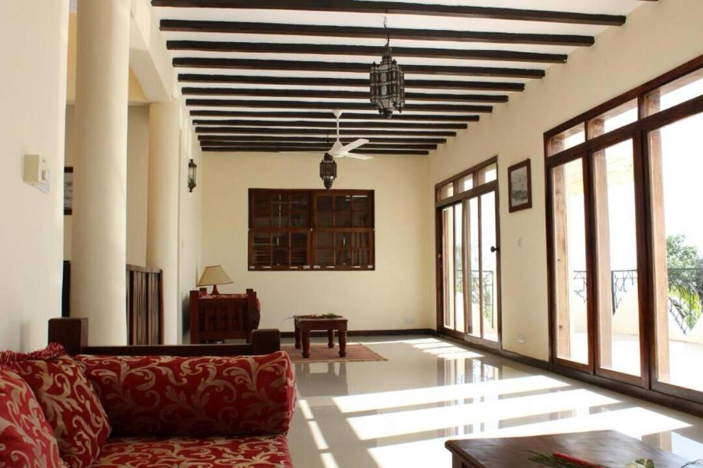 Villa lounge with traditional beamed ceiling at JAZ Aurora